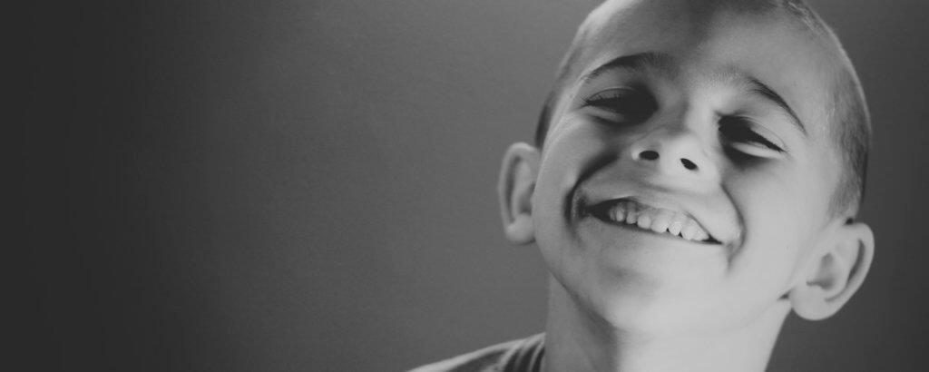 child smiling after visiting our pediatric dentistry in Raleigh, NC.